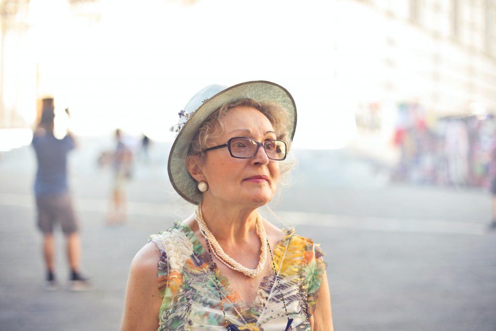 Mature lady with a hat on