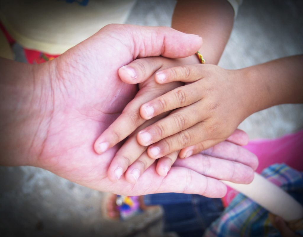 stack of hands.