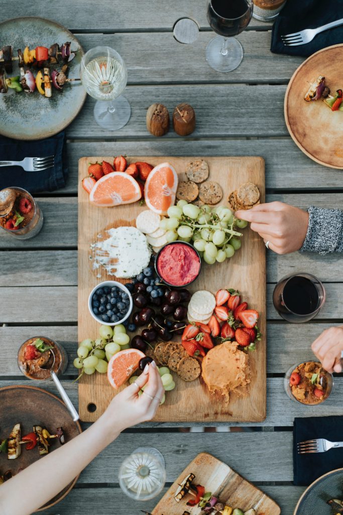 a board with summer food on