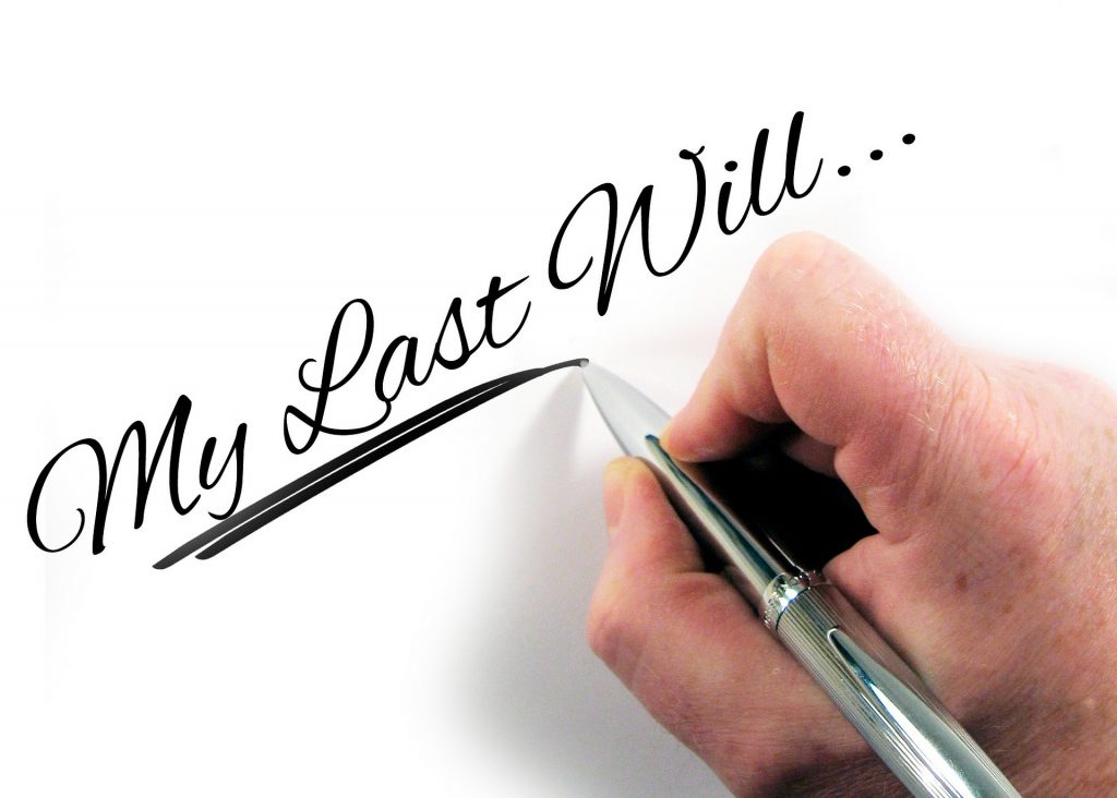 a pen writing a will