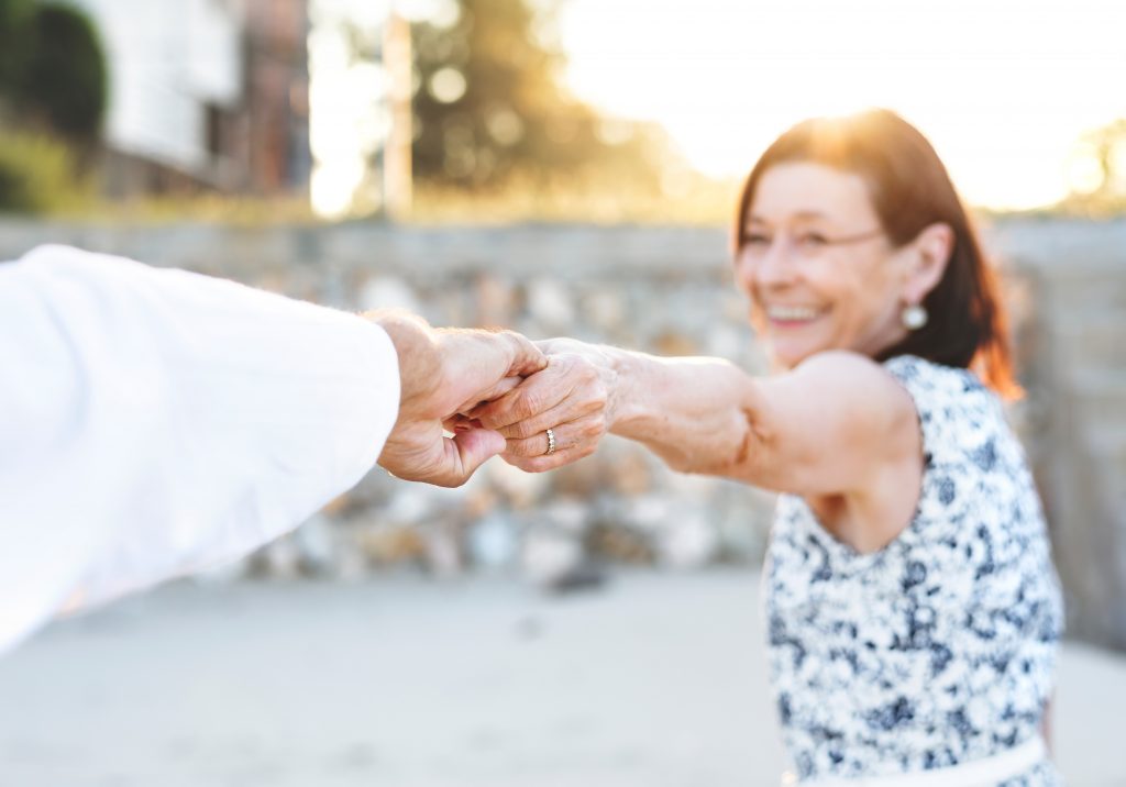 man and lady holding hands