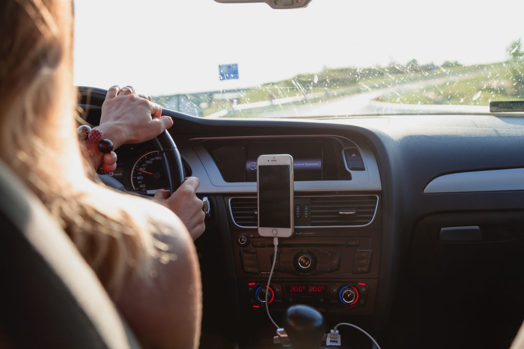 car dashboard with a mobile phone