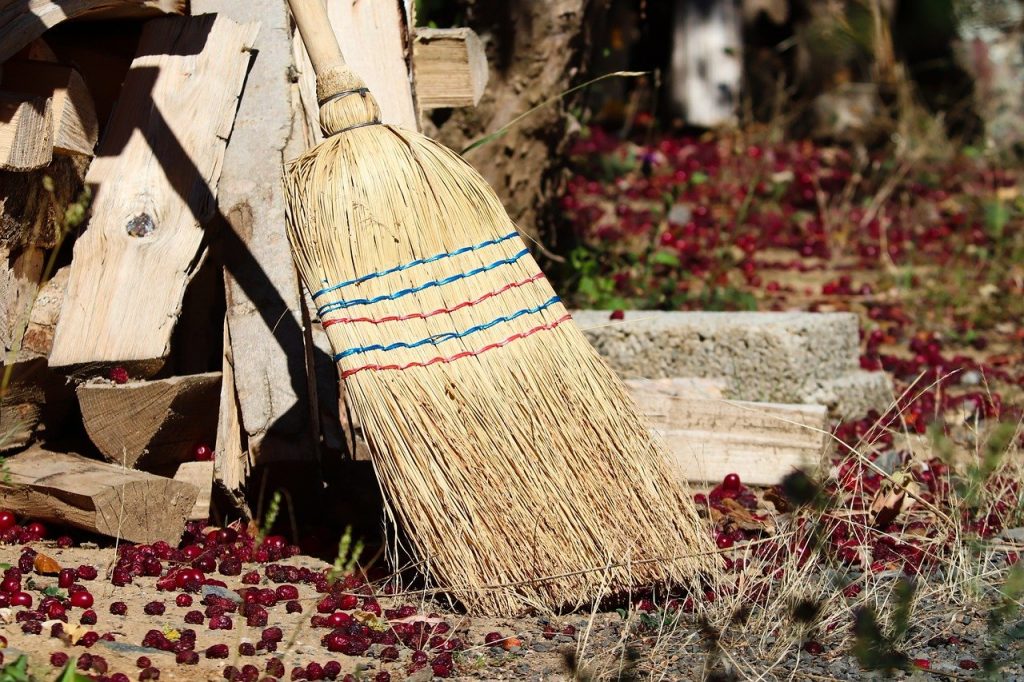 an old fashioned yard broom
